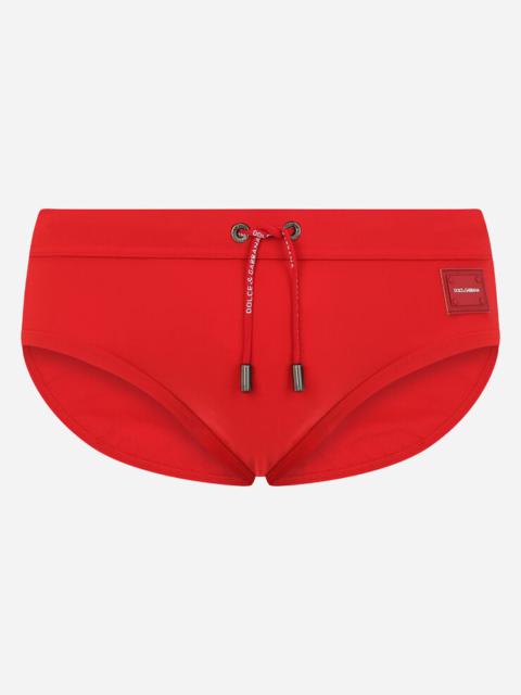 Dolce & Gabbana Swim briefs with high-cut leg and branded plate