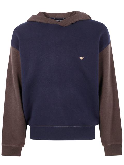 EMPORIO ARMANI Introducing the 'HOODED BICOLOR SWEATER' from Emporio Armani, a stunning addition to your wardrobe. 