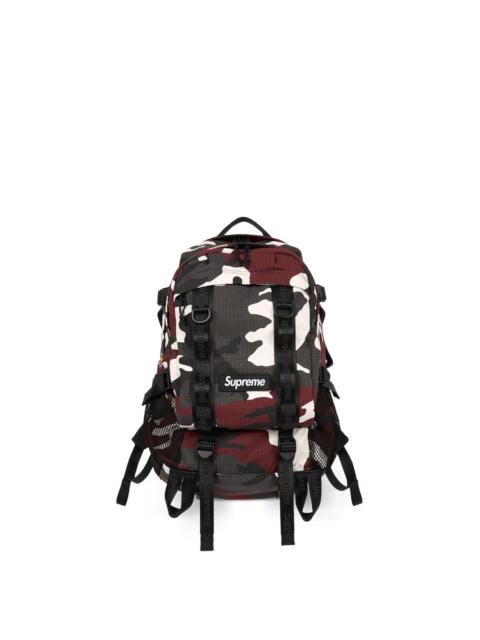 Supreme logo-detail all-over pattern backpack