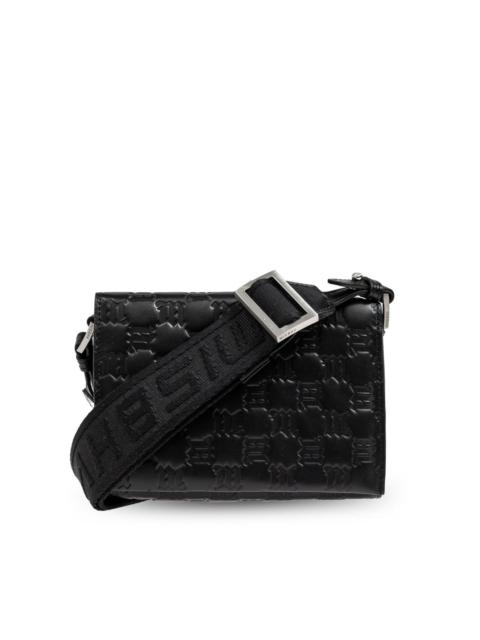 embossed monogram shoulder bag