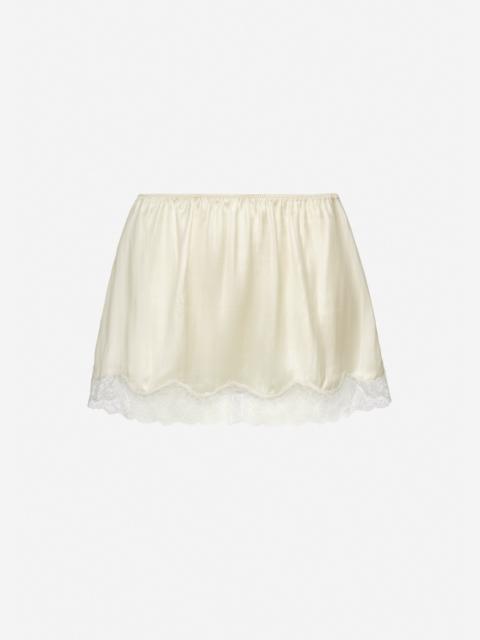 MAGDA BUTRYM Mini slip skirt with lace-trimmed hem in cream