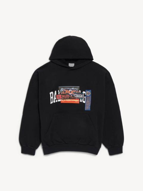 BALENCIAGA Men's Bumper Stickers Medium Fit Hoodie in Black