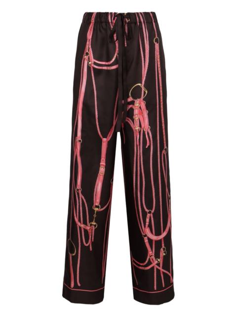 GUCCI graphic print tie trousers