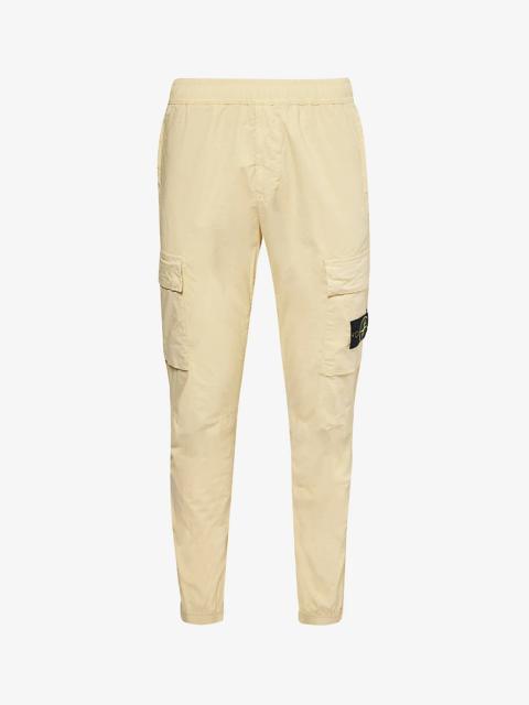 Logo-badge tapered-leg stretch-cotton cargo trousers