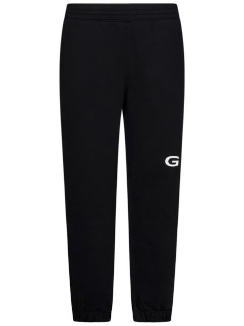 Givenchy Joggers in black cotton with white logo print on the left leg and 4G logo on the back.