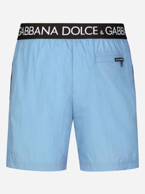 Dolce & Gabbana Mid-length swim trunks with branded stretch waistband
