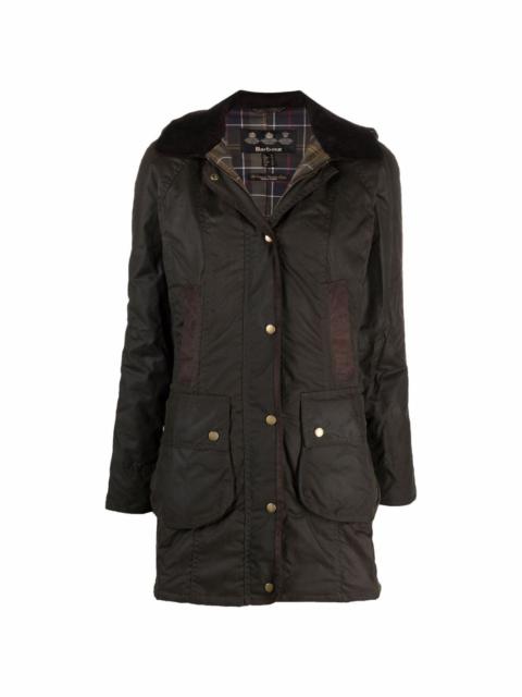 wax-coated buttoned-up coat