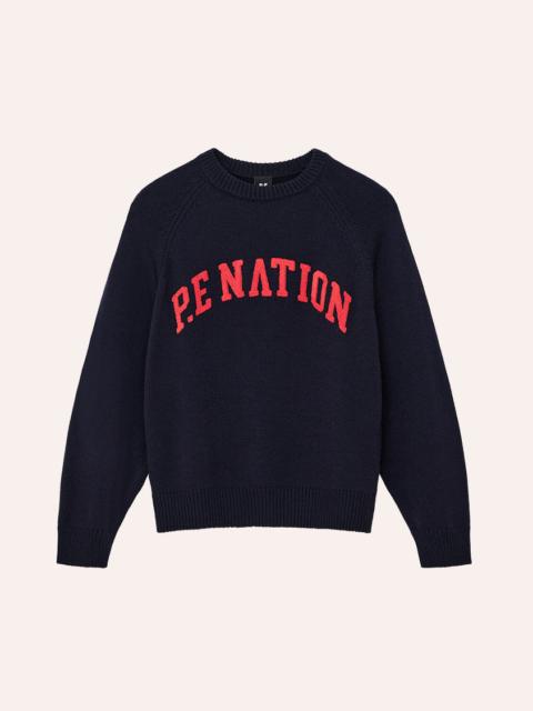 P.E NATION LEGACY KNIT CREW IN DARK NAVY & COLLEGE RED