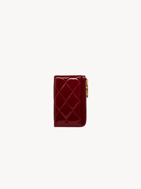 SAINT LAURENT CASSANDRE BIJOU ZIP CARD CASE IN PATENT LEATHER