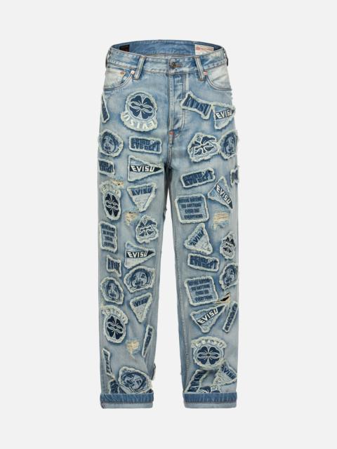 EVISU MULTIPLE BADGES DECONSTRUCTED RELAX FIT JEANS