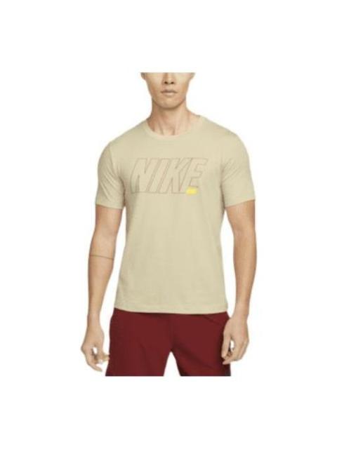 Nike 남자 나이키 단단한 색깔 알파벳 빠른 건조한 Breathable 훈련 스포츠 짧은 소매 황색 t-셔츠 DM6