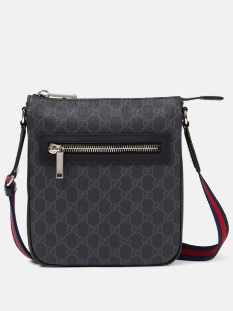 GG canvas leather-trimmed crossbody bag