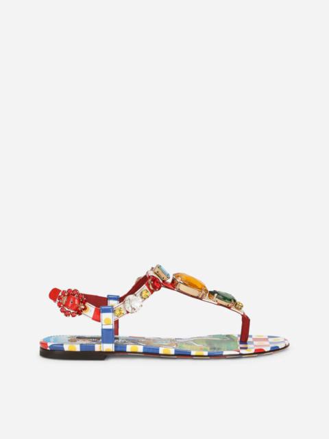Carretto-print patent leather thong sandals with bejeweled appliqué
