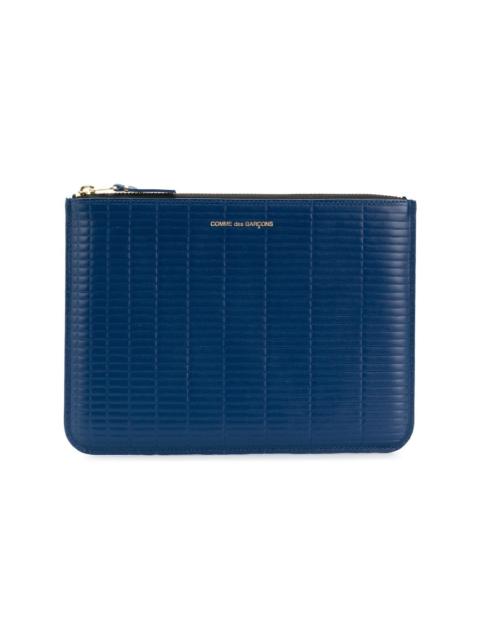 Comme Des Garçons embossed clutch bag