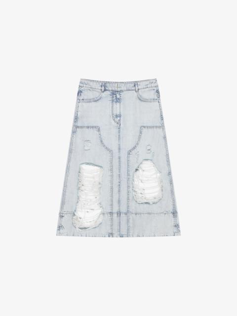 SKIRT IN DESTROYED DENIM WITH PATCHES