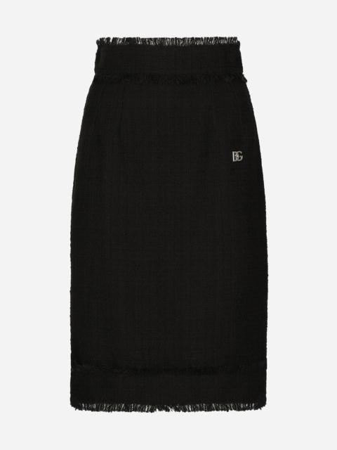 Dolce & Gabbana Tweed midi skirt with DG logo
