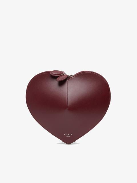 Alaïa Le Coeur dark red leather crossbody bag