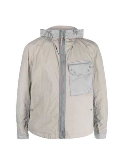 zipped-up chest-pocket jacket