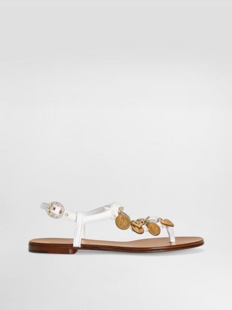Dolce & Gabbana Raffia thong sandals with embroidered votive medallions