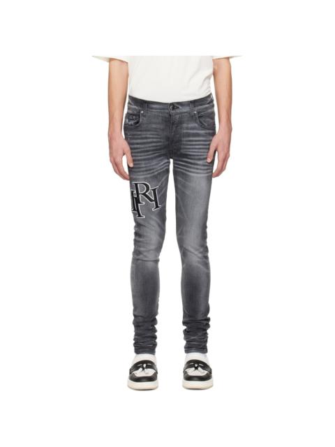Black Staggered Jeans