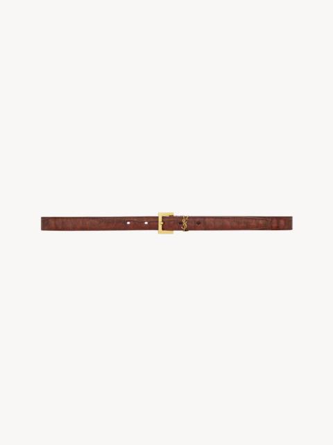 SAINT LAURENT CASSANDRE THIN BELT IN CROCODILE-EMBOSSED LEATHER