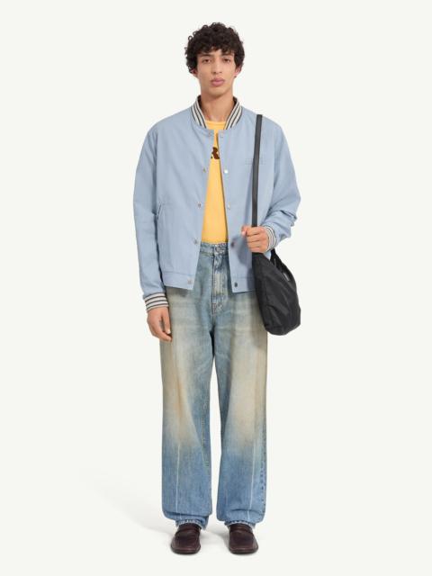 MM6 Maison Margiela A classic varsity silhouette refined through a softened structure. The jacket balances utilitarian c