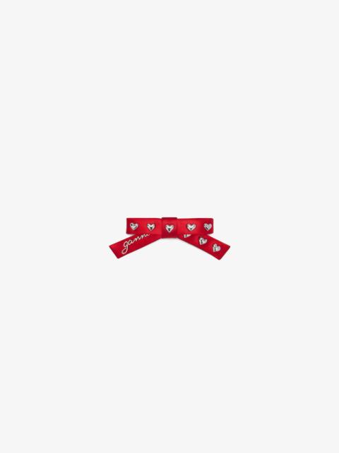 GANNI RED EYELET BOW BARRETTE