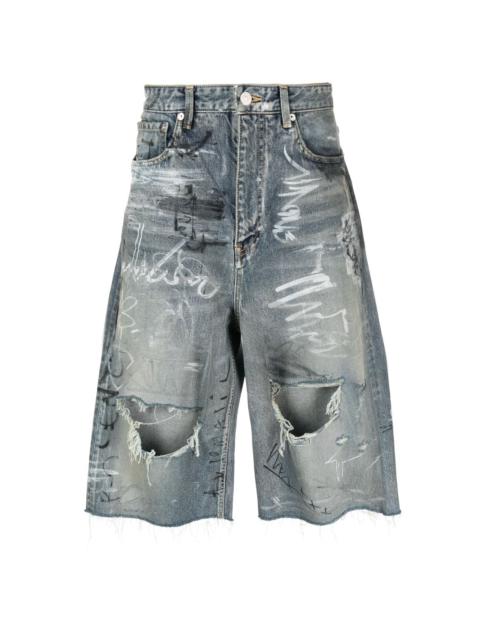 BALENCIAGA Baggy graffiti-print denim shorts