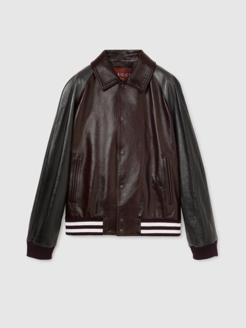 GUCCI Embossed leather bomber jacket