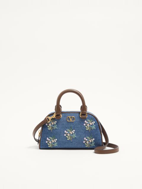 Valentino VALENTINO GARAVANI VLOGO SIGNATURE MINI TOP-HANDLE BAG IN DENIM WITH FLORAL EMBROIDERY