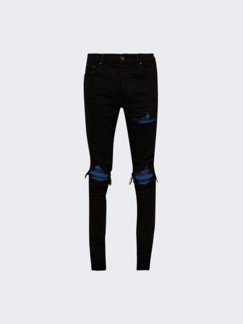 AMIRI MX1 Ultra Suede distressed jeans