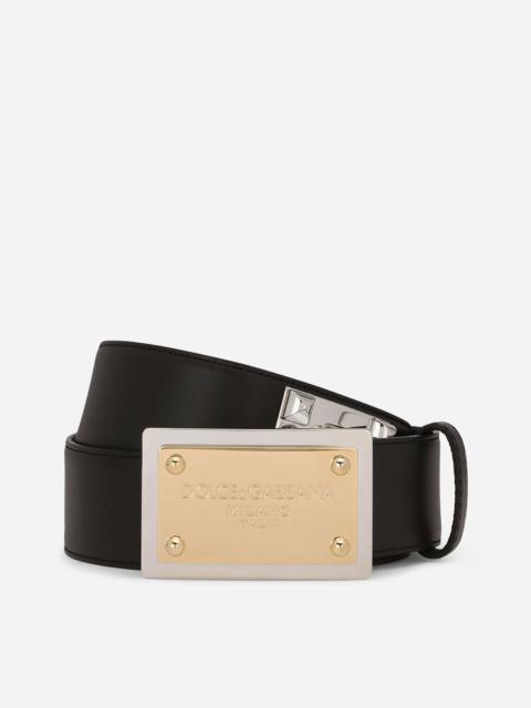 Calfskin belt with chain and branded tag