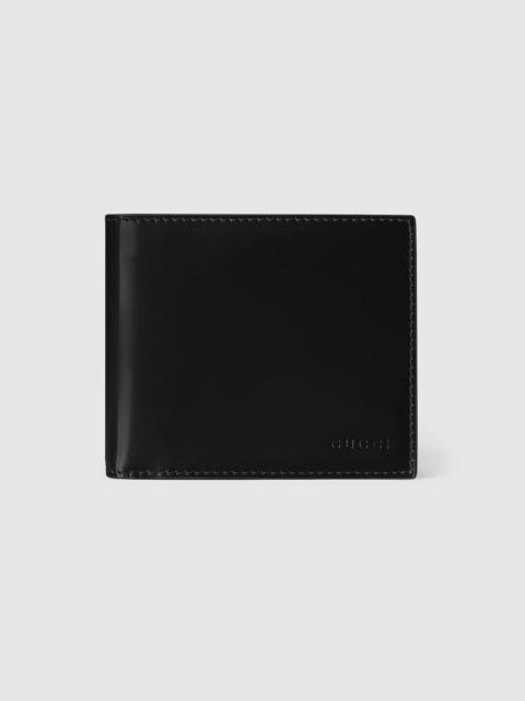 GUCCI Bi-fold embossed wallet