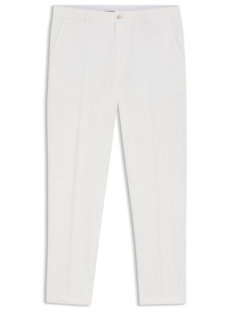 BOSS TAPERED-FIT TROUSERS IN STRETCH-COTTON SEERSUCKER