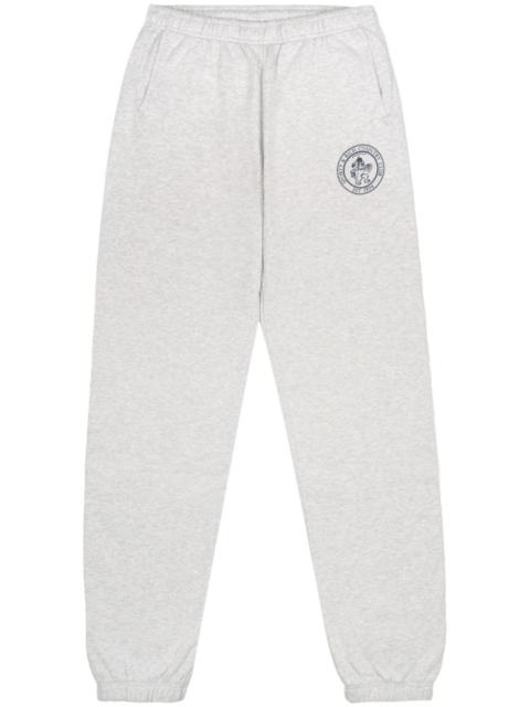 Sporty & Rich lion crest-print track pants