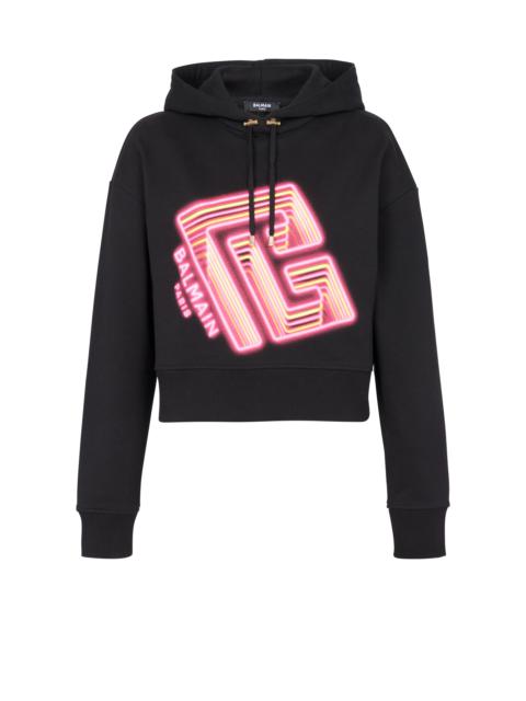 Cropped hoodie with neon printed labyrinth logo
