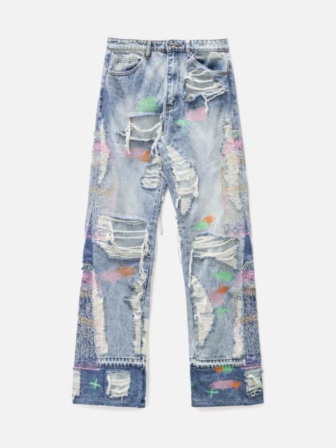 WHO DECIDES WAR TECHNICOLOR EMBROIDERY DENIM