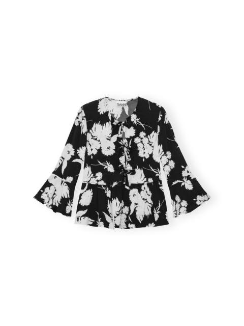 PRINTED CREPE PEPLUM BLOUSE