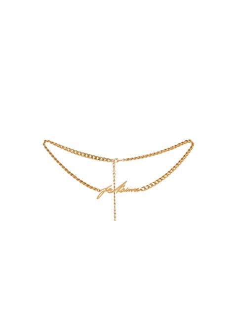 Balmain "Je t'aime" brass chain belt