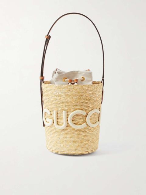 GUCCI Leather-trimmed appliquéd raffia bucket bag