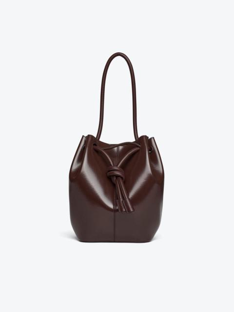 Nanushka ELONGATED BUCKET MEDIUM - Alt-nappa bucket bag - Coffee bean