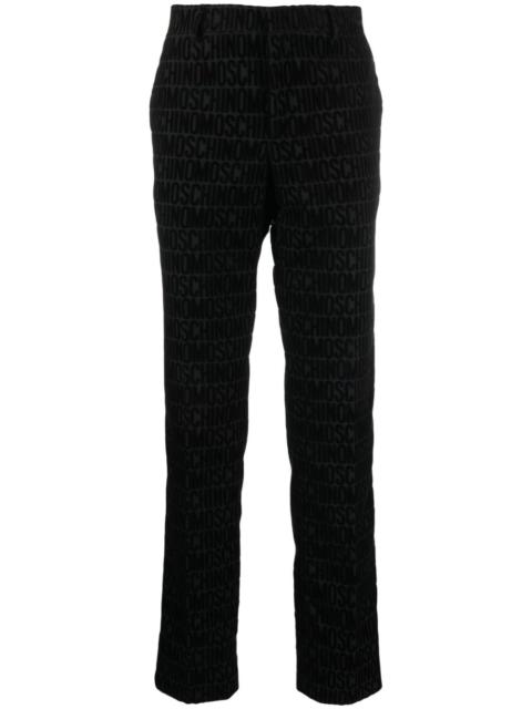 Moschino flocked-logo straight-leg trousers