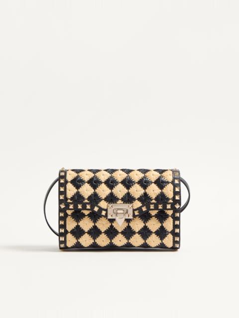 VALENTINO GARAVANI ROCKSTUD SMALL SHOULDER BAG IN EMBROIDERED SYNTHETIC RAFFIA