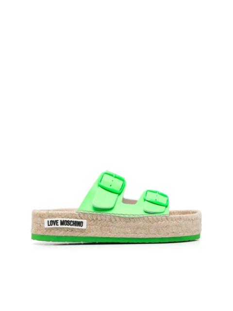 Moschino side-buckle detail logo mules
