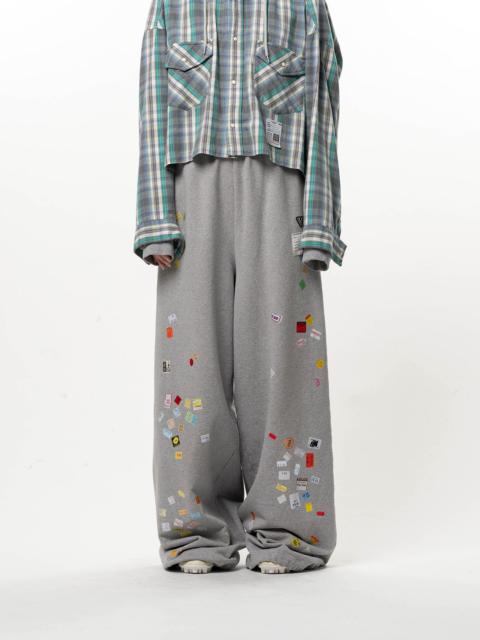 Maison MIHARAYASUHIRO Price Tag Sticker Printed Wide Sweat Pants