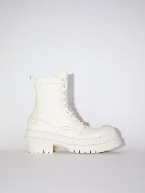 Acne Studios Lug sole ankle boots - Pale yellow/white
