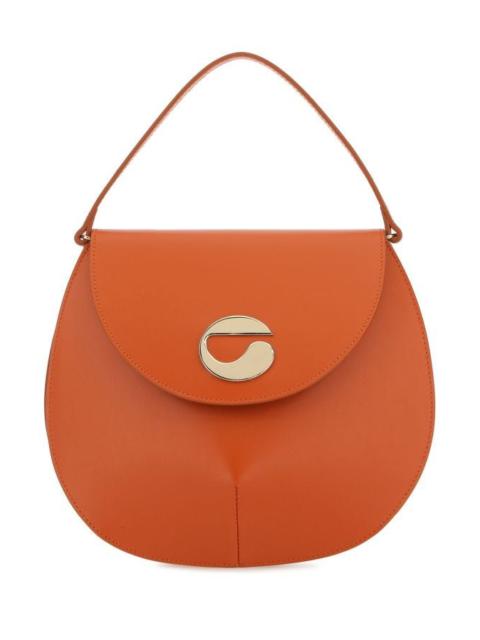 COPERNI Orange leather U.F.O. handbag