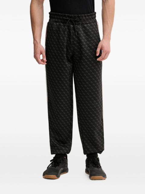 GUESS USA pattern side stripe track pants