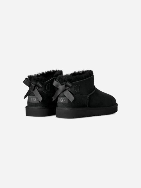 UGG ® Women's Ultra Mini Bailey Bow Sheepskin Classic Boots in Black