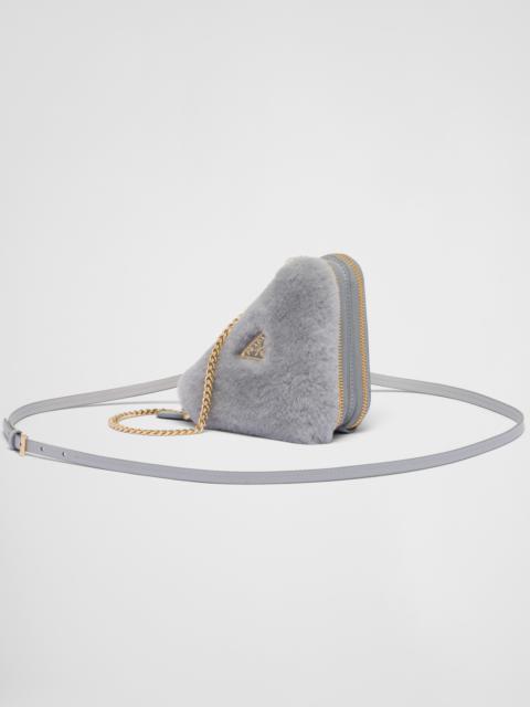 Prada Triangular shearling and Saffiano leather mini-pouch